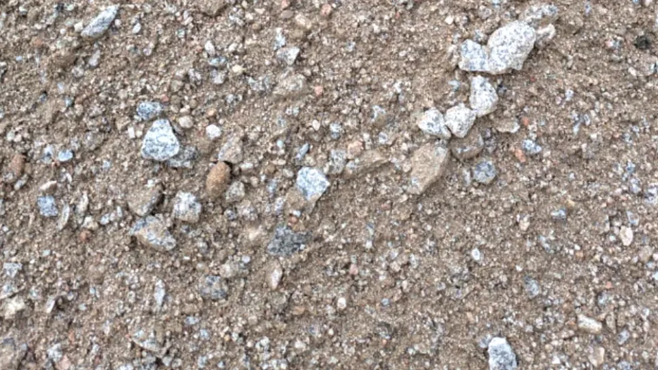 Unspec Roadbase: brown roadbase with scattered grey stones